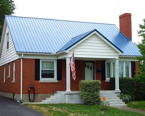 metal roof awning on brick house|brick house metal roof colors.